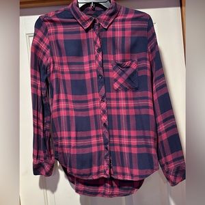 Woman’s small fusia/navy plaid flannel shirt.